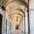 typical covered walkway, the portico of placa do comercio, lisbon Royalty Free Stock Photo