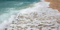 Typical Croatian pebbled beach and waves, Croatia