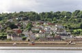 Dawlish, devon: low tide and sailing boats. devonshire houses