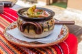 Typical dish of Bulgaria - Gyuveche. Meal baked in a clay po