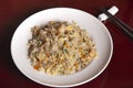 Typical dish of Chinese gastronomy. Cantonese style rice. Isolated image