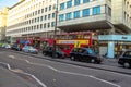 Typical double decker buses in The Strand in London. One of the finest streets in Europe.