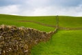 Typical dry stones wall on the pasture in Yorkshire Dales Royalty Free Stock Photo