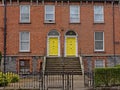 Typical Dublin row houses with doors in yellow