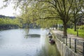 Typical Dutch canal landscape with water, trees, grass and boat Royalty Free Stock Photo