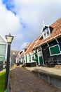 Typical Dutch houses with gardens in village Marken Royalty Free Stock Photo