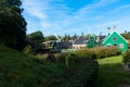 Typical dutch scene with green farmhouses in dutch landscape