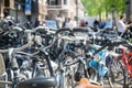 typical dutch transportation scenery. lots of parked bicycles in a row on a parking lot for bikes in a city centre in Royalty Free Stock Photo