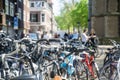 typical dutch transportation scenery. lots of parked bicycles in a row on a parking lot for bikes in a city centre in Royalty Free Stock Photo