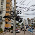 A typical electrical pole with a mess of wires that is all throughout Cartagena, Columbia