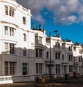 Typical English building, white buildings along the street, reno Royalty Free Stock Photo