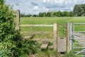 Typical english country stile with dog gate, Gloucestershire Royalty Free Stock Photo