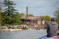 Typical English river scene with beautiful natural light and old buildings with chimney