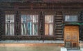 Typical Facade with carved ornaments of an old wooden house in russian stile Royalty Free Stock Photo