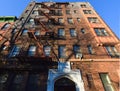 Typical facade of houses with fire exit stairs in Brooklyn neighborhood