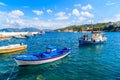 Typical fishing boats in Kokkari port on beautiful summer day, Samos island, Greece Royalty Free Stock Photo
