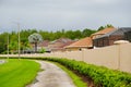 A typical Florida community, wall and road Royalty Free Stock Photo