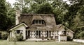 Typical french countryside house with thatch roof