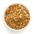 Typical french dijon rough mustard in round dish