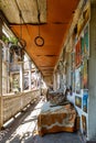 A typical georgian yard of an old traditional wooden house and clothes and linen drying on the ropes. Tbilisi Georgia