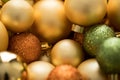 Typical German glass Christmas tree decoration, balls and ornaments in gold, bronze and green with matt, glitter and shiny finish