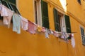 Typical glimpse of the Ligurian alleys: cloths lying outside the balconies