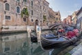 Typical gondolas parked in a Venetian canal, Venice, Italy Royalty Free Stock Photo