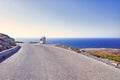 Typical Greek miniature roadside shrine. Small Greek Orthodox chapel at Crete with sea background