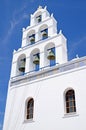 A typical Greek Orthodox church bell tower with multiple bells, Santorini, Greece Royalty Free Stock Photo