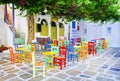 Typical Greek taverns on the streets. Ios island