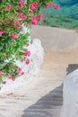 Typical greek traditional village with white walls and colorful doors with sea view on Mykonos Island, in Greece Royalty Free Stock Photo