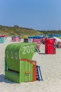 Typical green beach chair on the beach of Borkum