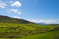 Typical green Irish country side with blue sky and cluds Royalty Free Stock Photo