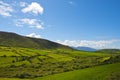 Typical green Irish country side with blue sky and cluds