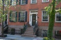 Typical Greenwich Village brick stone houses with iron railings and stairs