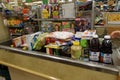 A typical grocery checkout counter filled with food and disinfectant cleaning supplies at a Publix grocery store