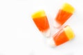 Typical halloween candy corn isolated on white background. Top view. Royalty Free Stock Photo
