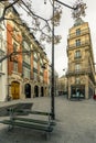 Typical Haussmann buildings and street near stock exchange market monument in paris Royalty Free Stock Photo