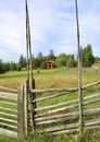 Typical house behind a wooden fence in a village in Leksand, Sweden
