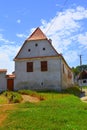 Typical house and rural landscape in the village Veseud, Zied, Transylvania