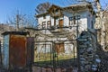 A typical house with a vineyard in the yard in village of Rozhen, Bulgaria Royalty Free Stock Photo