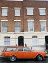 Typical houses and vintage car in the London Borough of Camden England