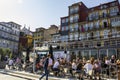 Typical houses and outdoor cafes at historic Ribeira Square of Porto Royalty Free Stock Photo