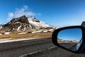 Typical Iceland landscape with road and mountains.