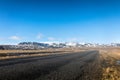 Typical Iceland landscape with road and mountains.