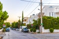 Typical idyllic street at dawn and sunrise in Voula Greece