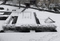 Typical image for June in the city of Bern, where snow is still present. Snow-covered children`s playground