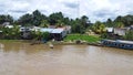 Typical indigene village along the Amazon River in the Amazonia Rain Forest South America Royalty Free Stock Photo