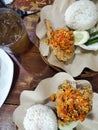 A typical Indonesian food, ayam geprek, which tastes spicy and delicious Royalty Free Stock Photo