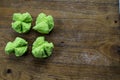 Typical Indonesian sweets green bolu kukus on table next to each other with copy space on the right for text